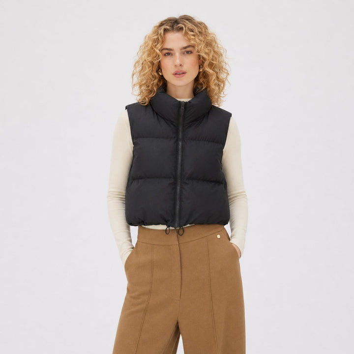 Women's cropped quilted puffer vest with mock neck and zip front