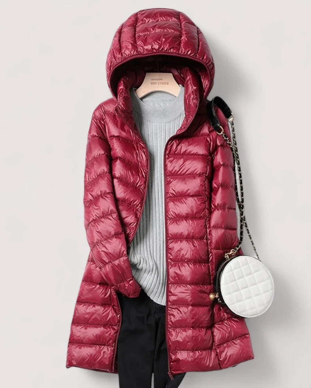Women's long hooded quilted puffer coat with zip front