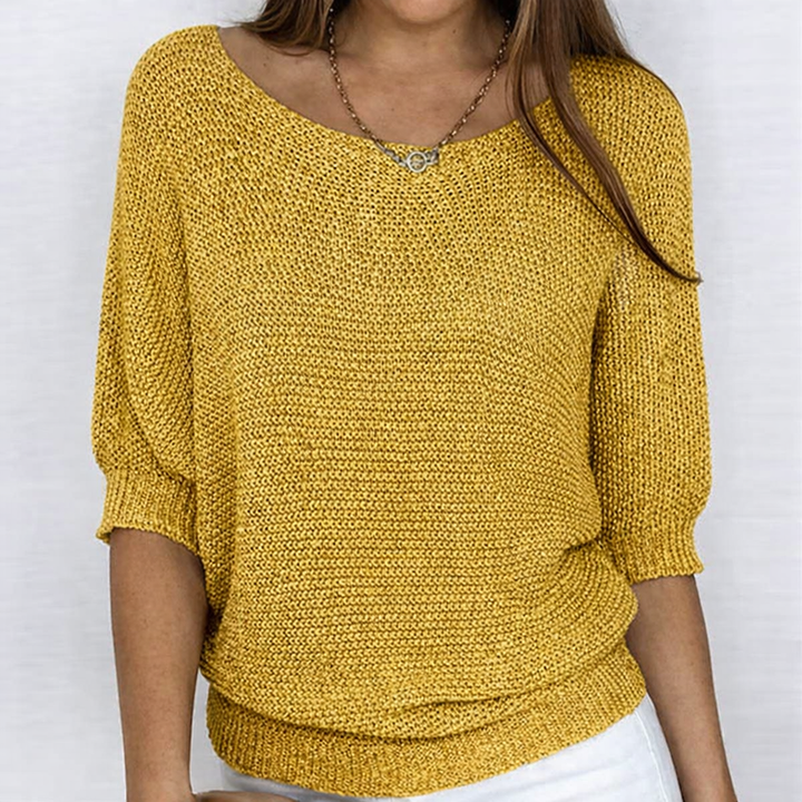 Women's textured knit sweater with round neckline and 3/4 sleeves