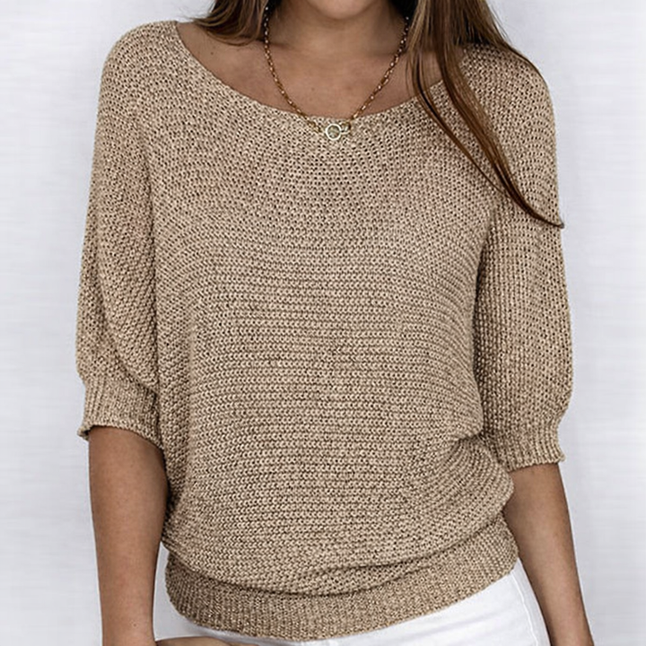 Women's textured knit sweater with round neckline and 3/4 sleeves