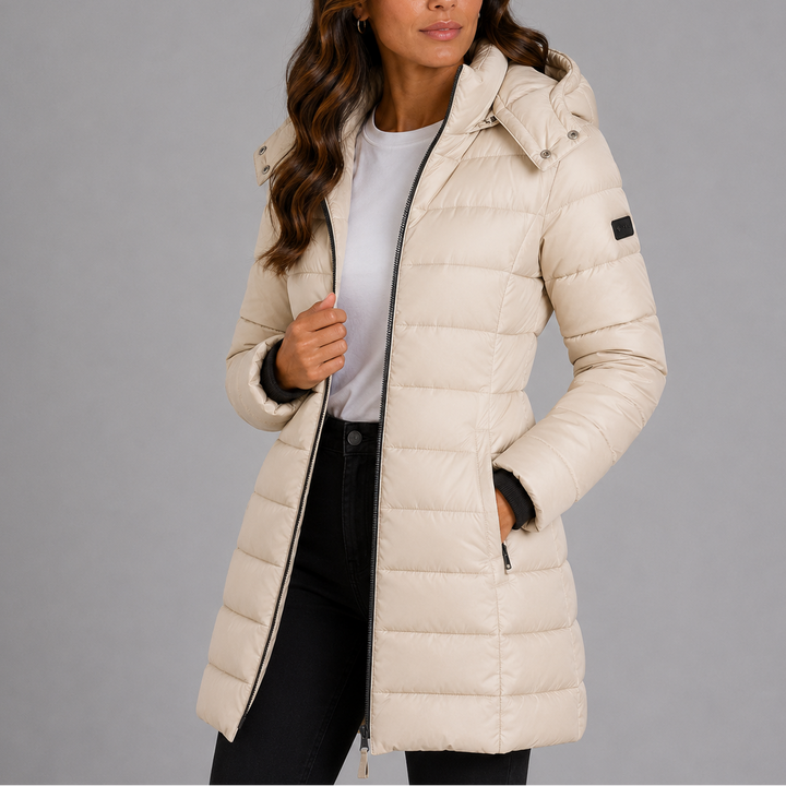 Women's hooded quilted puffer jacket with long sleeves and zip front