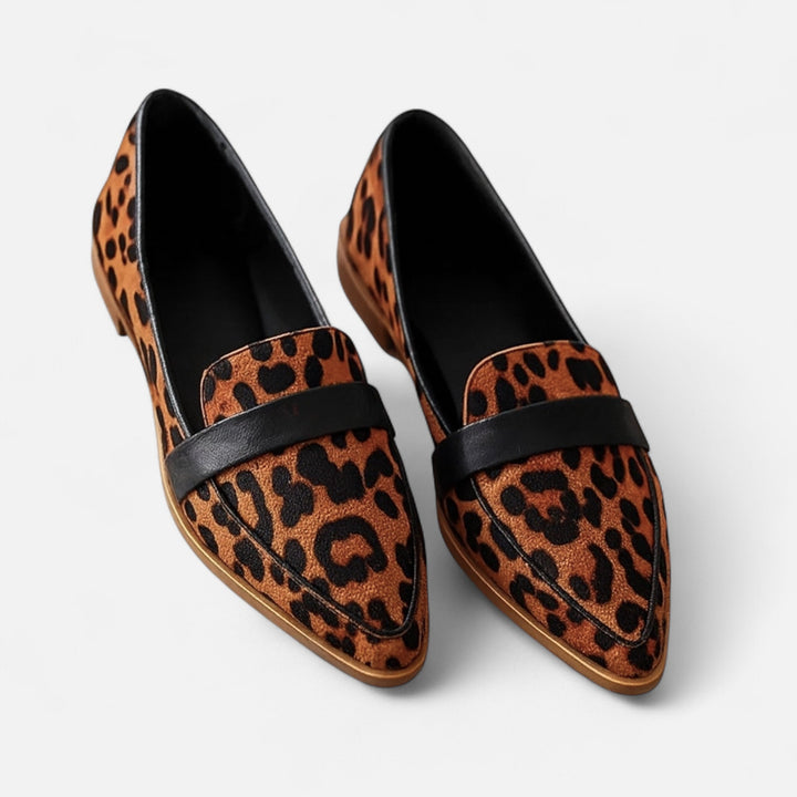 Women's pointed slip-on loafers with penny straps and low heels