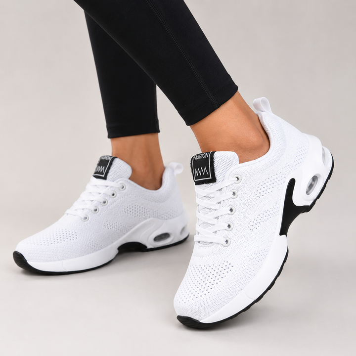 Women's low-top lace-up sneakers with textured uppers, round toes and contrasting soles