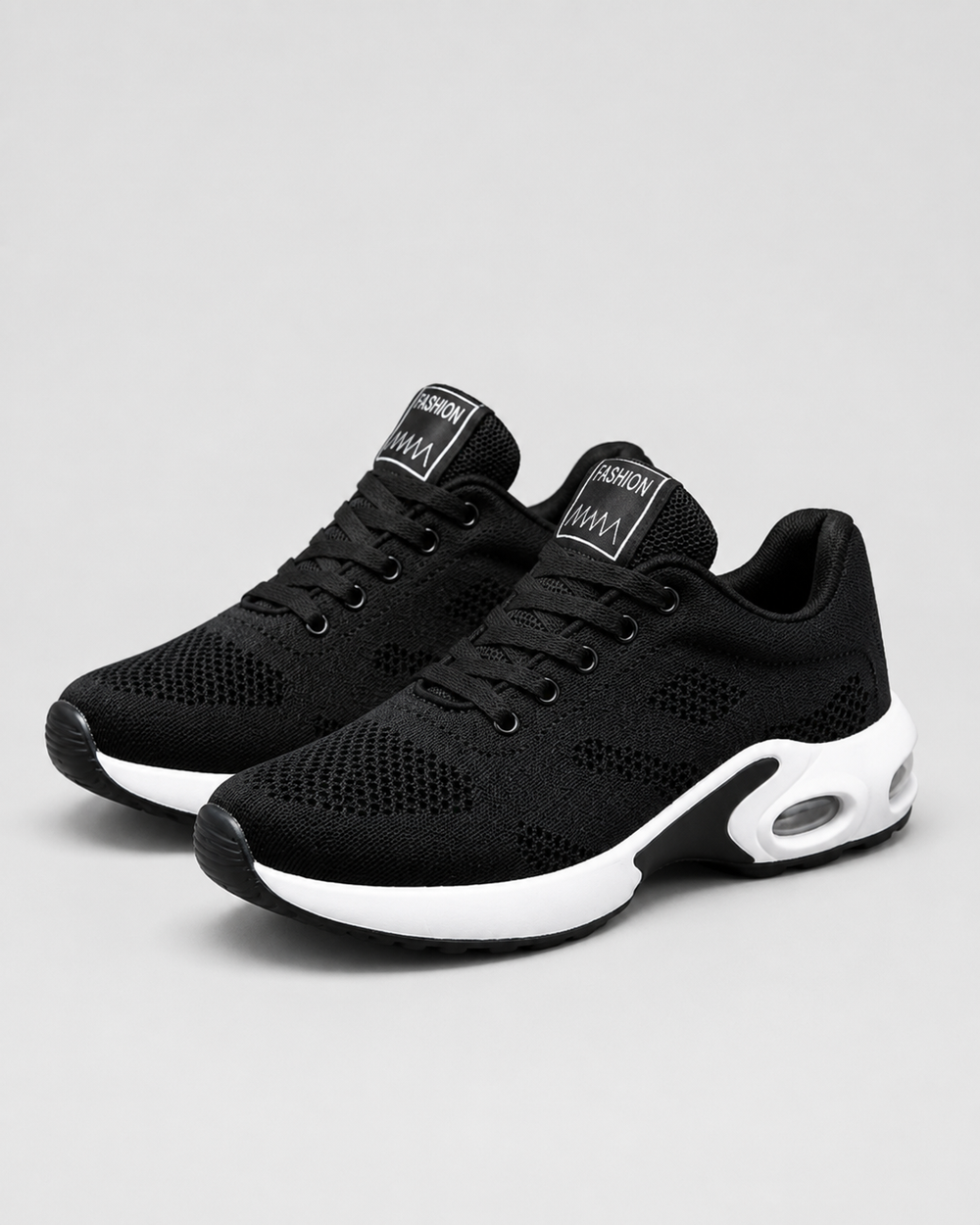 Women's low-top lace-up sneakers with textured uppers, round toes and contrasting soles