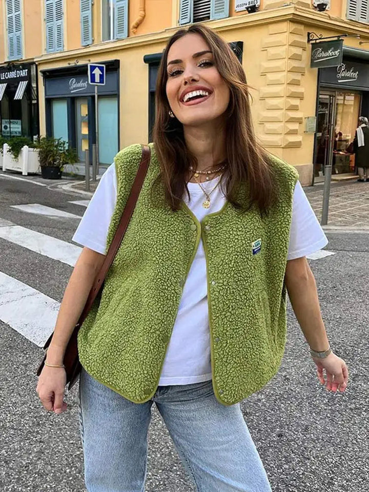 Women's textured fleece vest with V-neck and button front