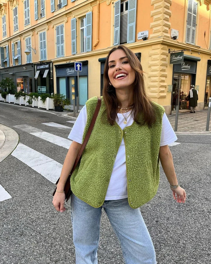 Women's textured fleece vest with V-neck and button front