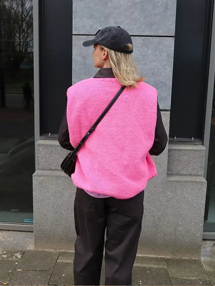 Women's textured fleece vest with V-neck and button front