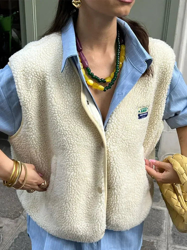 Women's textured fleece vest with V-neck and button front