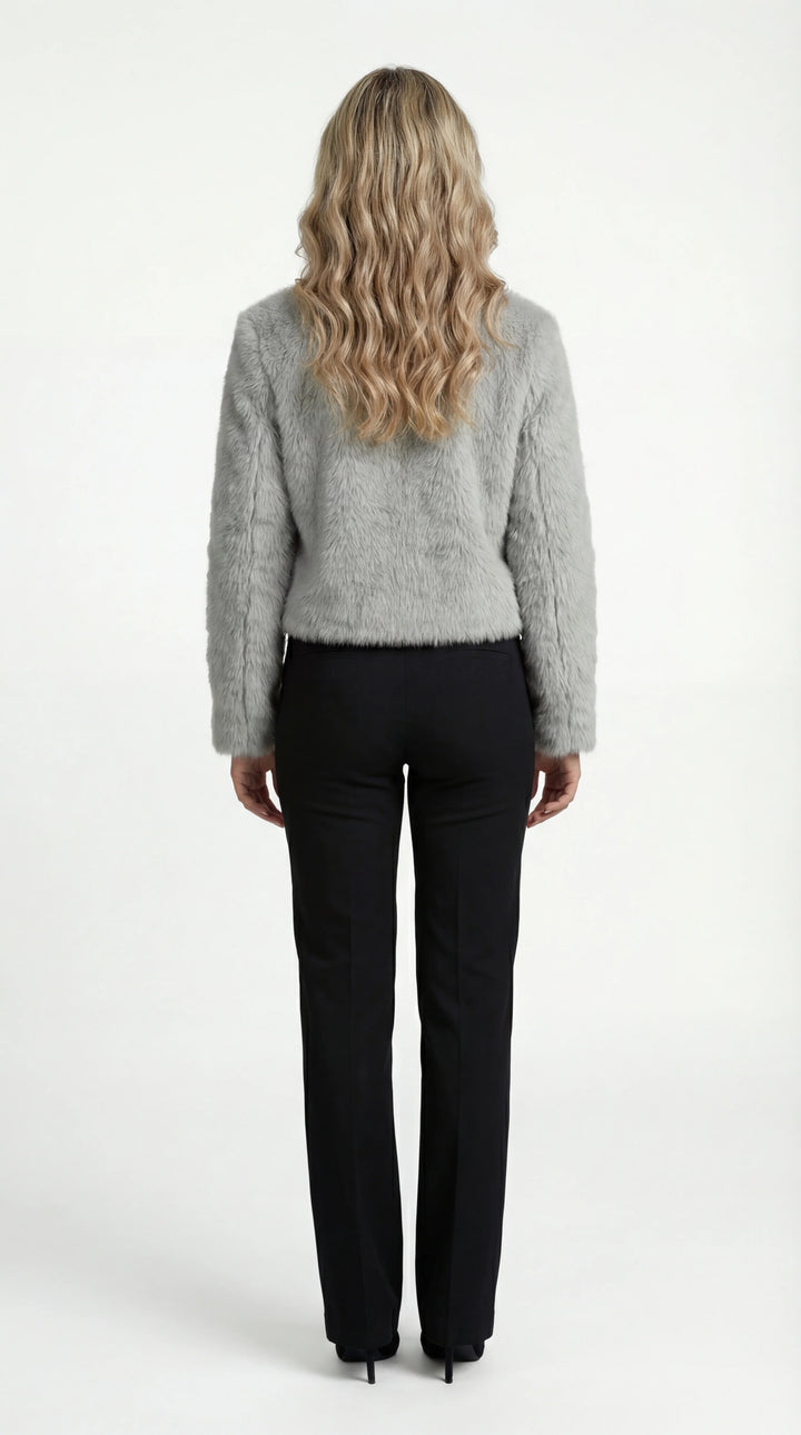 Women's cropped faux fur jacket with an open front and long sleeves