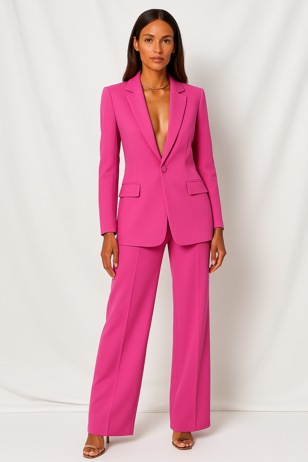 Women's tailored blazer and wide leg trousers set with notched lapels and flap pockets