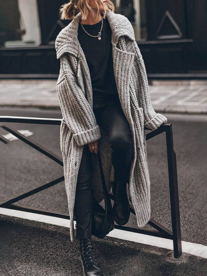 Women's oversized ribbed knit cardigan with shawl collar and button front