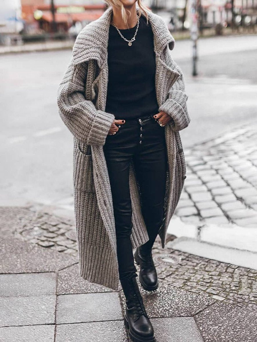 Women's oversized ribbed knit cardigan with shawl collar and button front