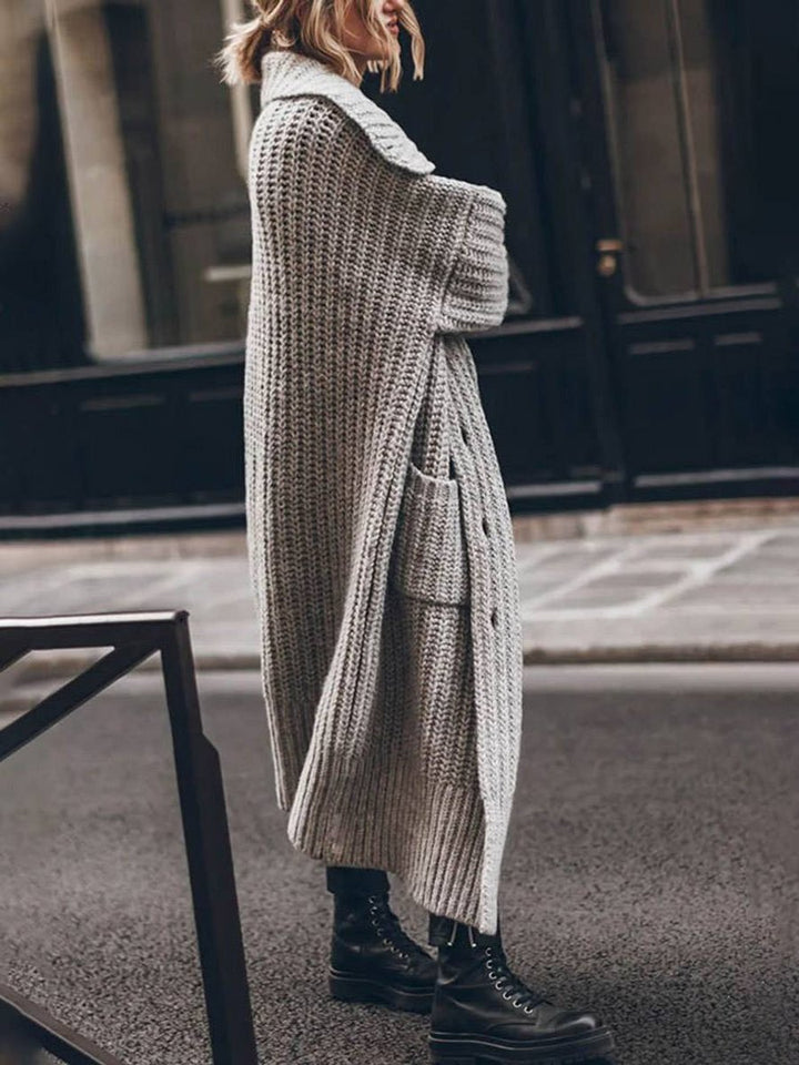 Women's oversized ribbed knit cardigan with shawl collar and button front