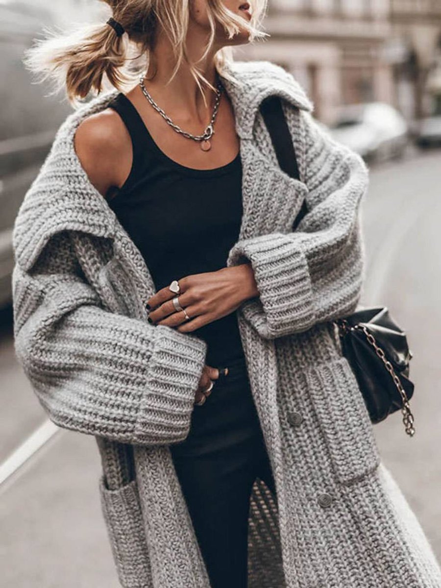 Women's oversized ribbed knit cardigan with shawl collar and button front