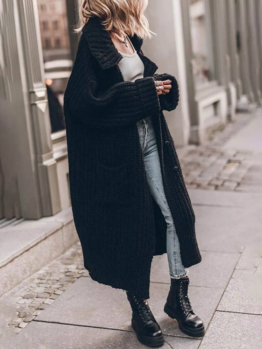 Women's oversized ribbed knit cardigan with shawl collar and button front