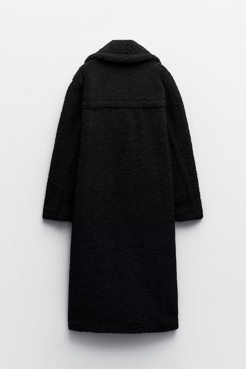 Women's long textured teddy coat with notched lapels and button front