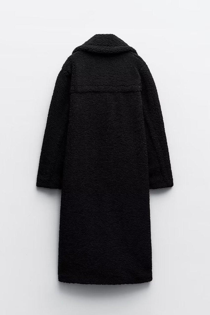 Women's long textured teddy coat with notched lapels and button front