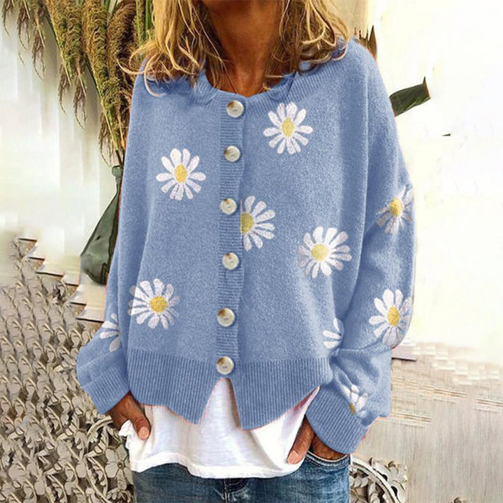 Women's floral knit cardigan with daisy motifs and button front