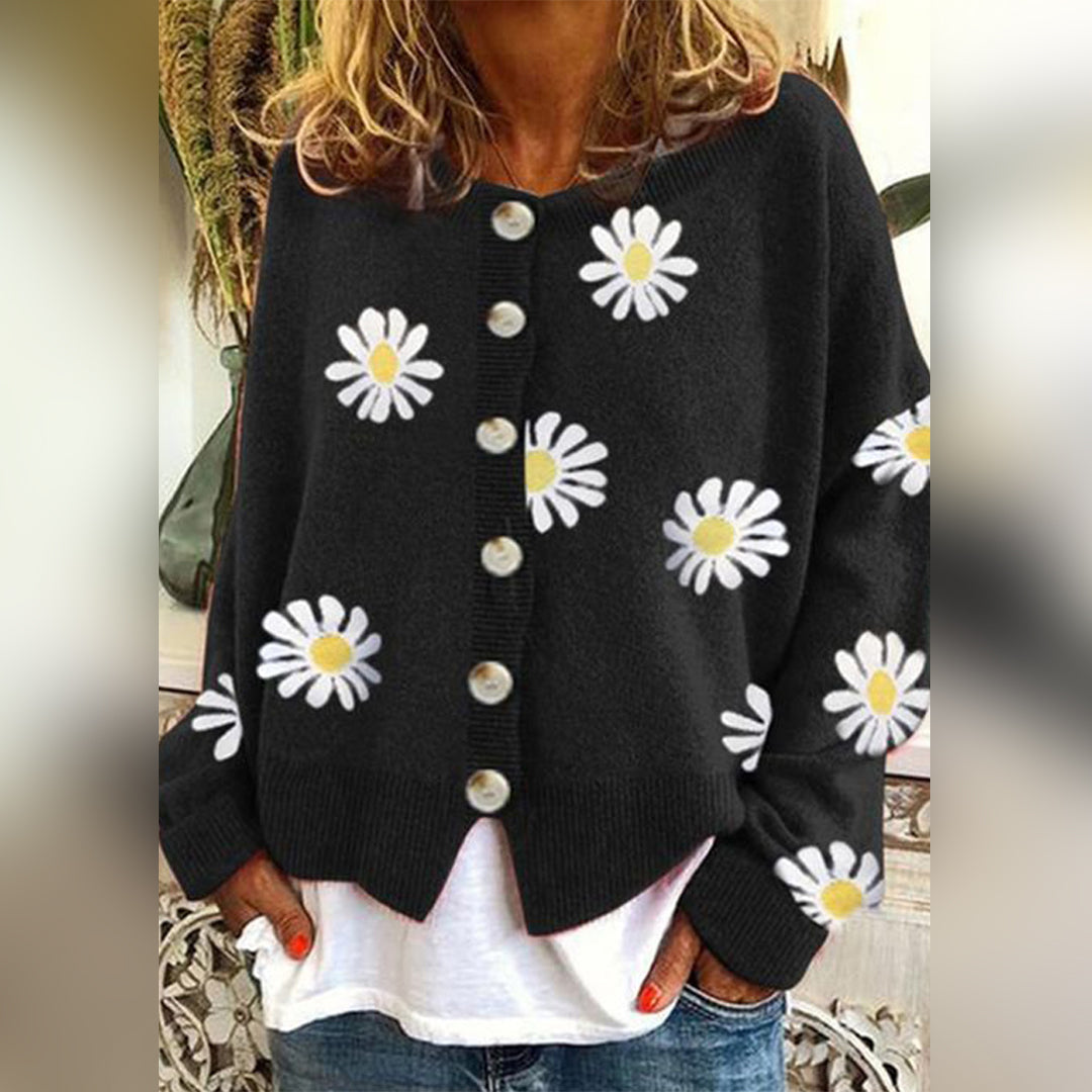 Women's floral knit cardigan with daisy motifs and button front
