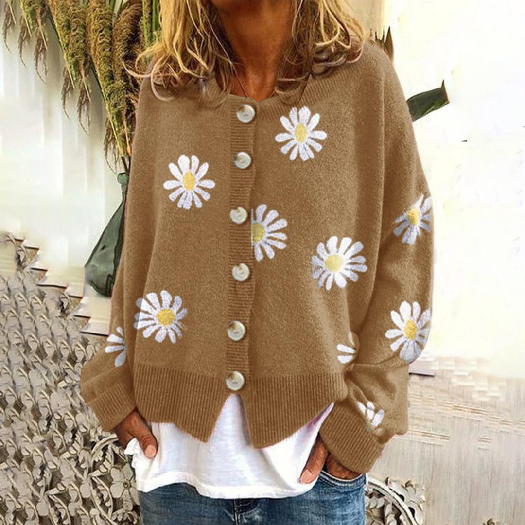 Women's floral knit cardigan with daisy motifs and button front