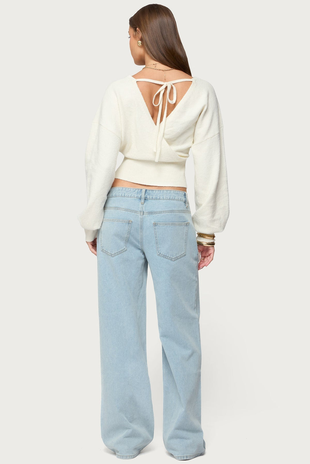 Women's cropped wrap sweater with V-neckline and long sleeves