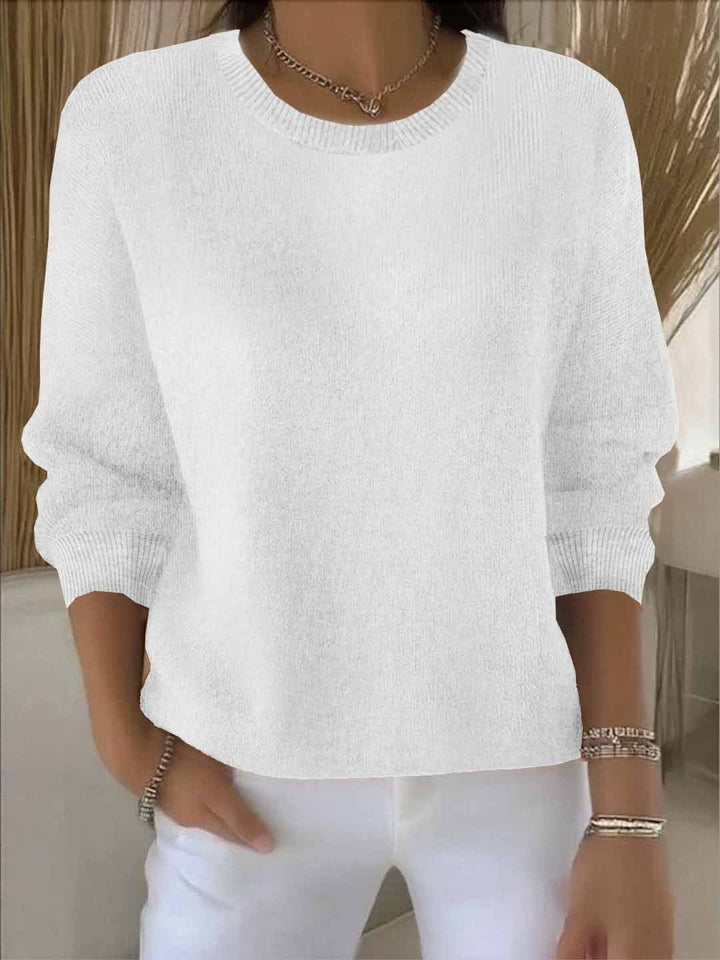 Women's long-sleeve crew neck knit sweater with ribbed trims