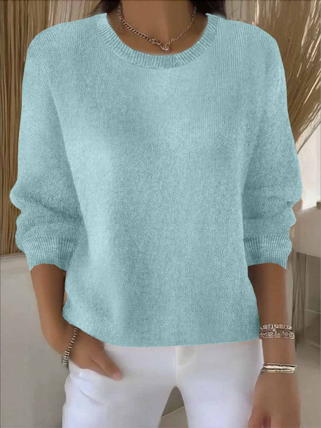 Women's long-sleeve crew neck knit sweater with ribbed trims