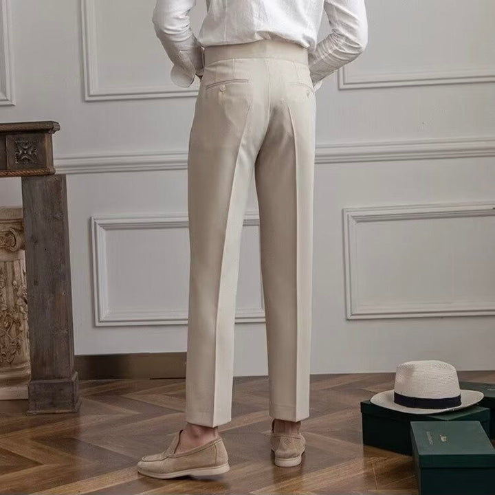 Women's high-rise pleated straight-leg trousers with belt loops and side pockets