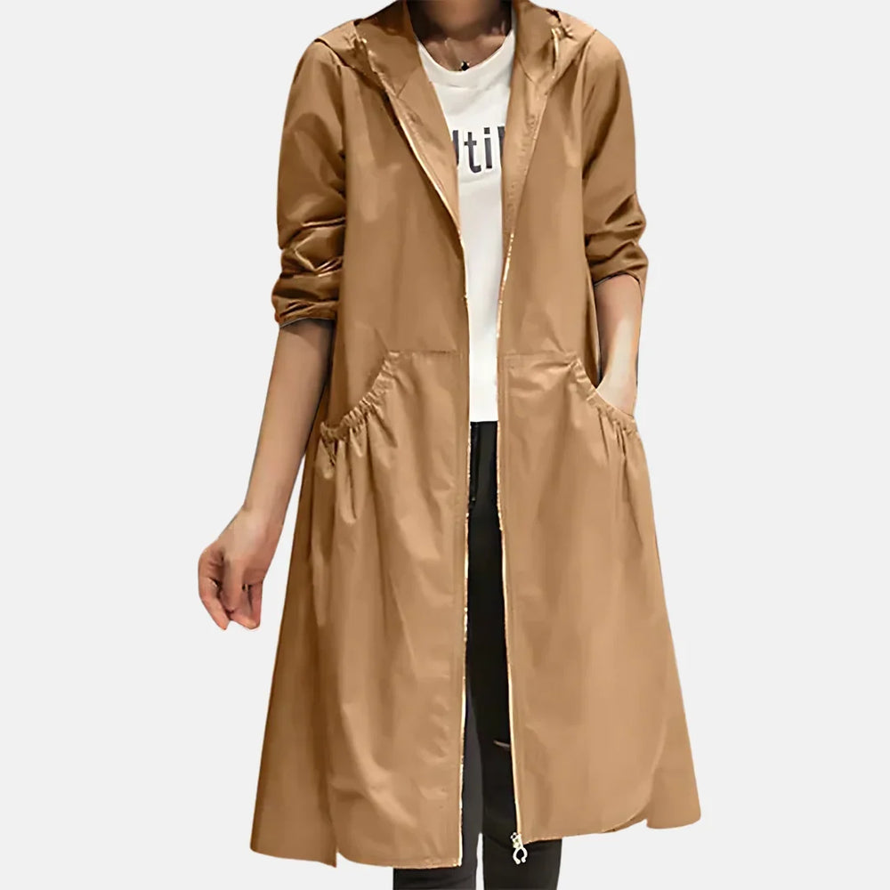Women's hooded knee-length coat with front zipper and large angled pockets
