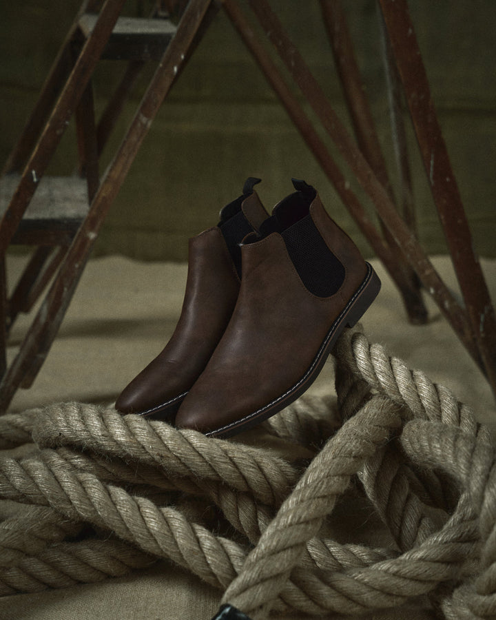 Chelsea ankle boots with elastic side panels, rear pull tabs and low heels
