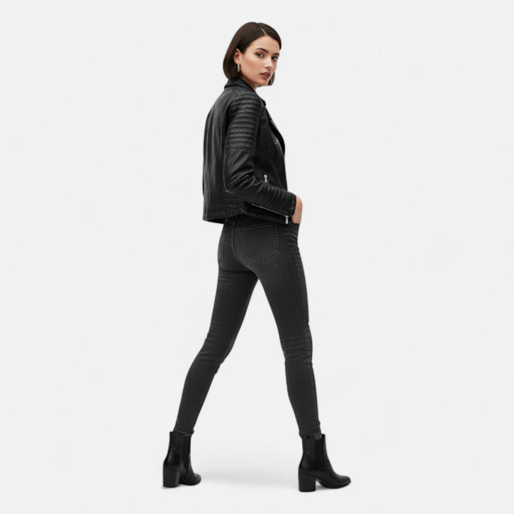 Women's black cropped biker jacket with asymmetric zipper and quilted sleeves