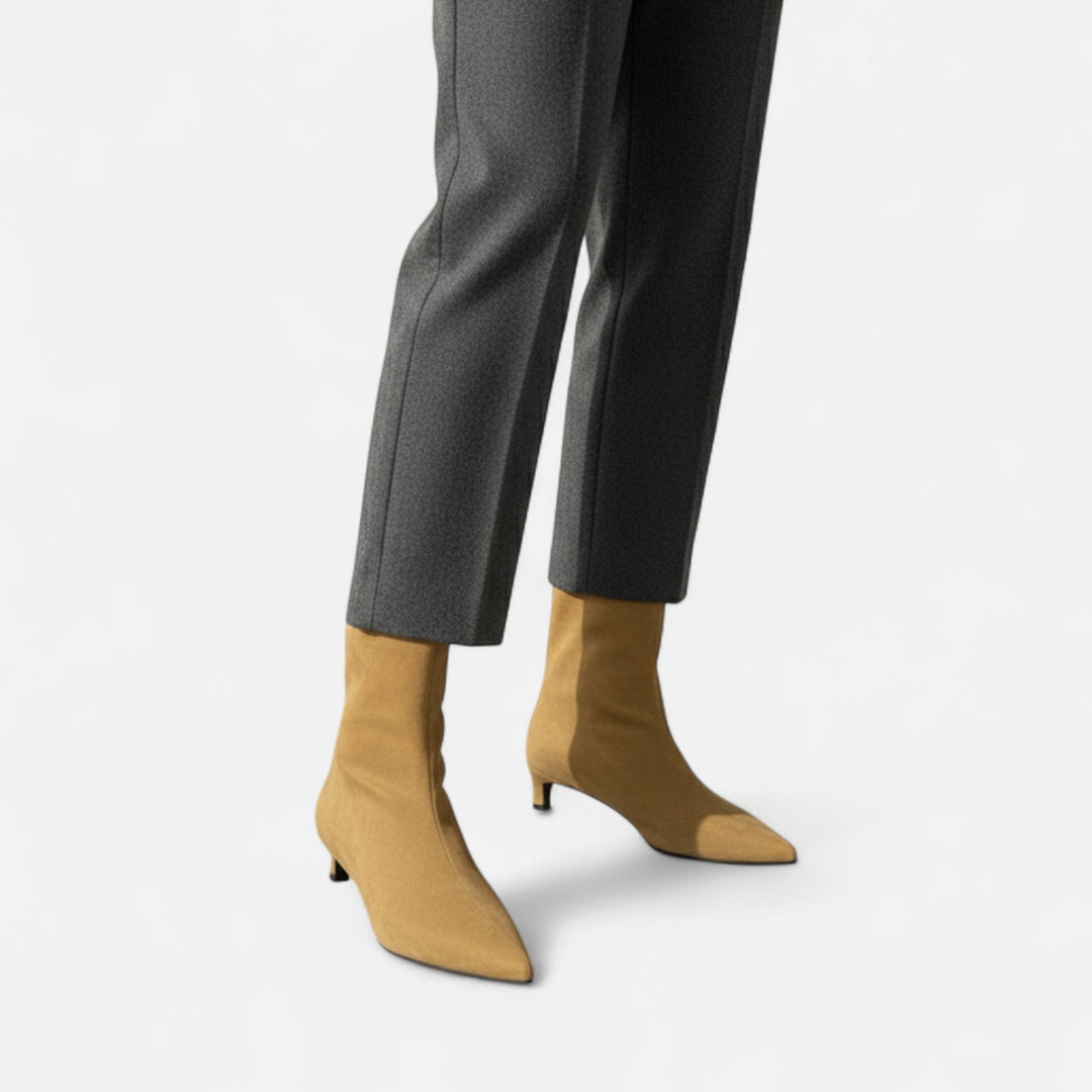 Women's pointed-toe ankle boots with low heels and slip-on shafts
