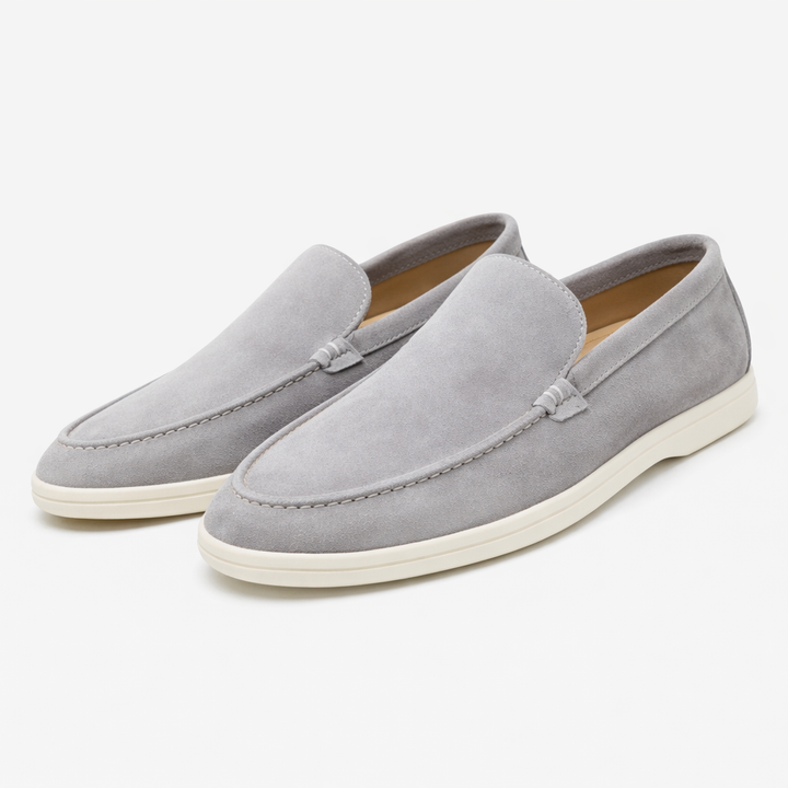 Unisex slip-on loafers with moc toe stitching and flat soles