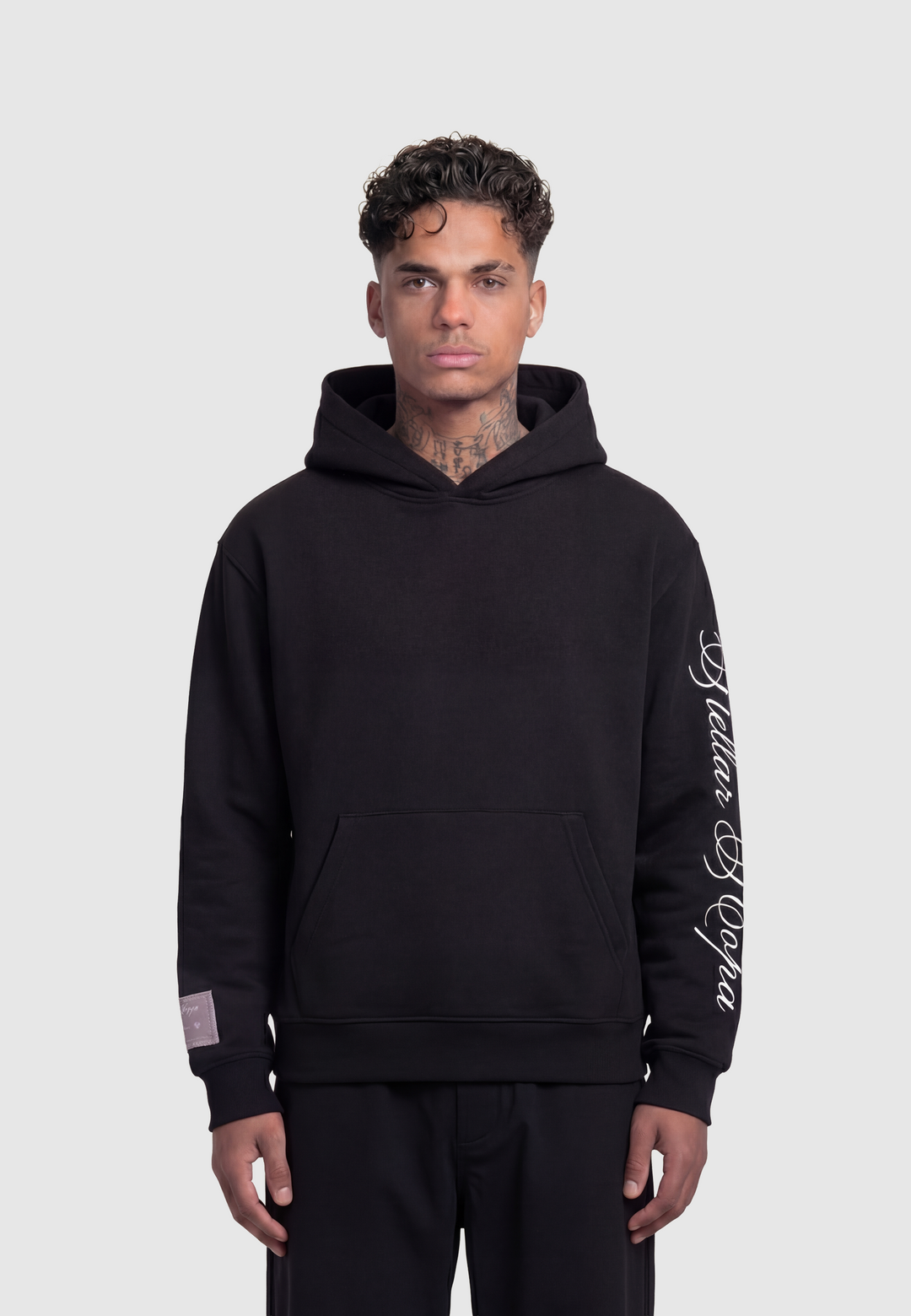 Black hooded sweatshirt with kangaroo pocket and white sleeve script