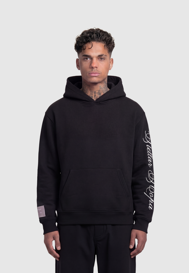 Black hooded sweatshirt with kangaroo pocket and white sleeve script