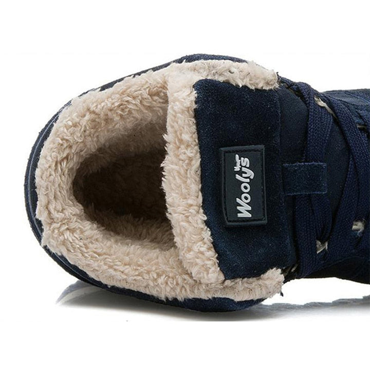 High-top lace-up sneaker boots with faux-fur collars and contrasting midsoles