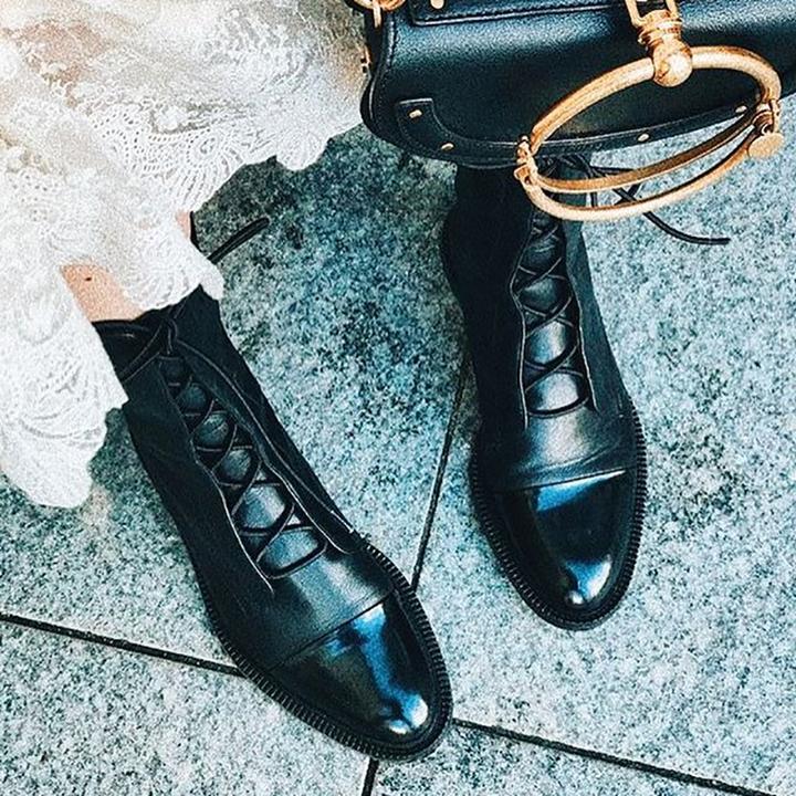 Women's tall classic lace-up boots with almond toes and low heels