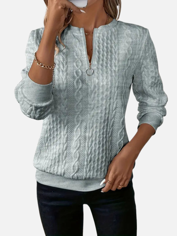 Women's long-sleeve cable knit half-zip jumper with textured panels