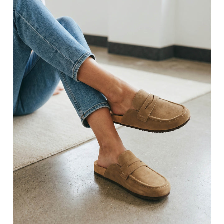 Women's beige loafer mule clogs with round toes and flat soles