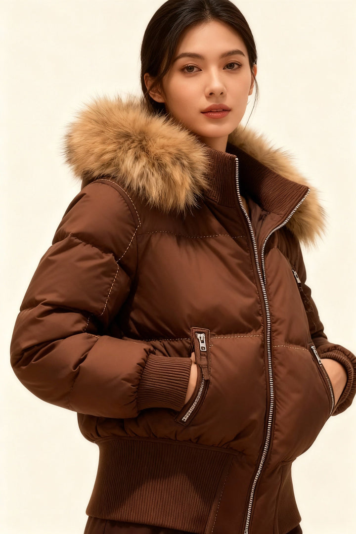 Women's hooded puffer jacket with fur-trimmed hood and zip front