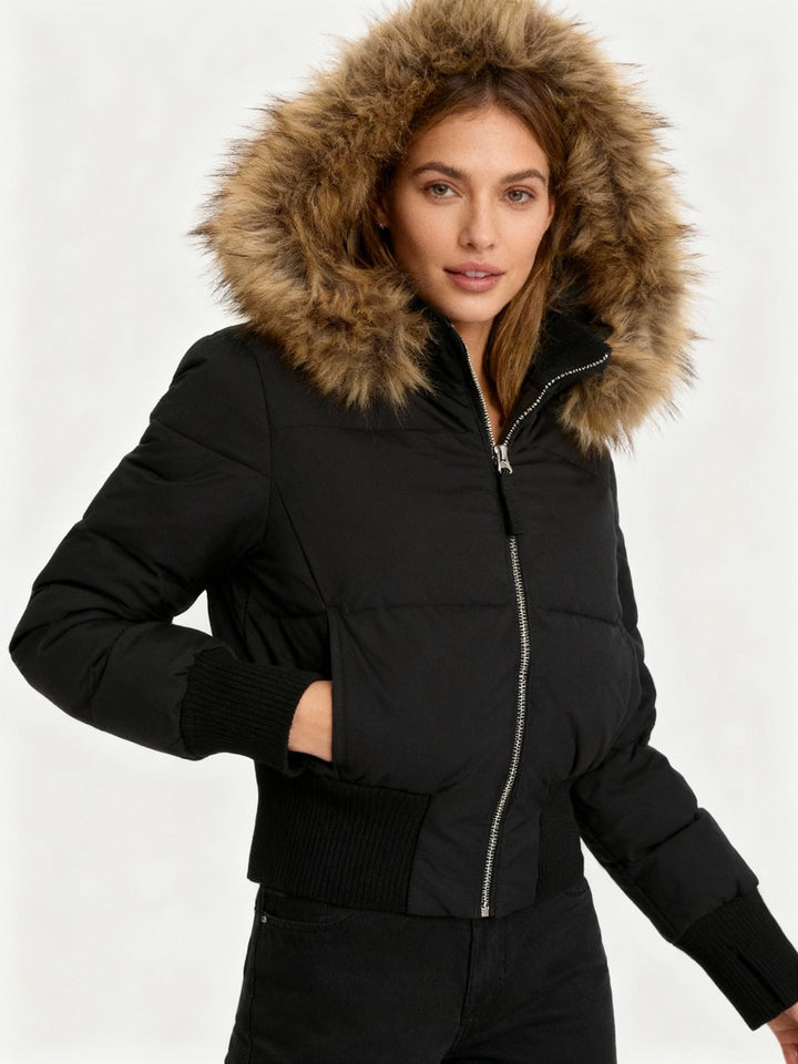 Women's hooded puffer jacket with fur-trimmed hood and zip front