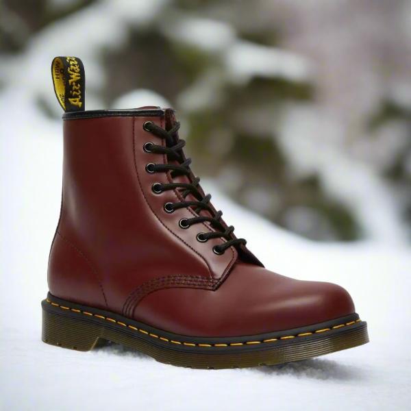 Unisex lace-up combat ankle boot with round toe and chunky sole