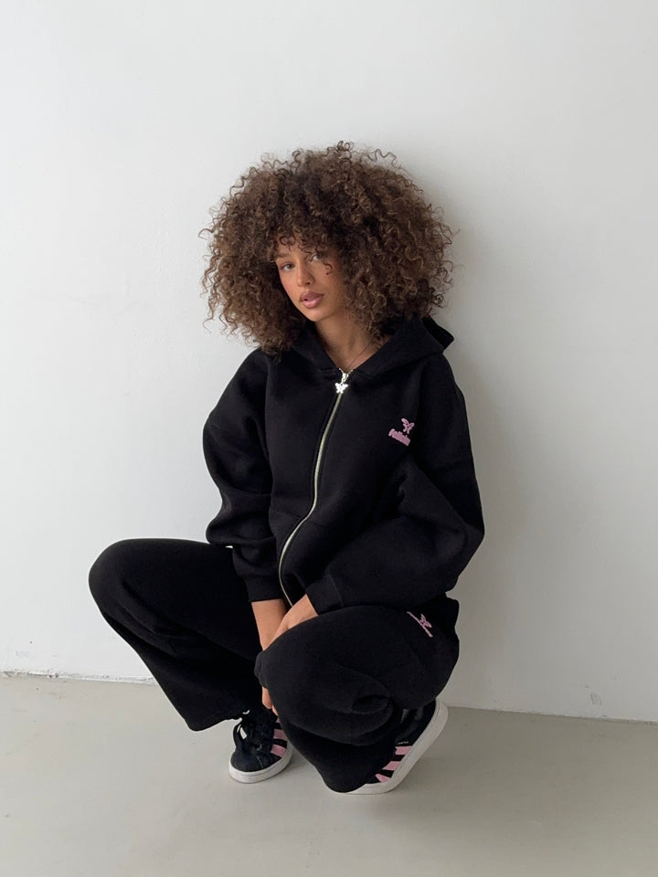 Black unisex logo zip-up hoodie with hood and long sleeves