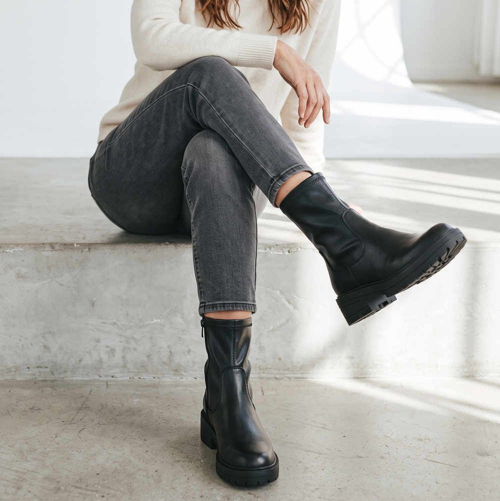 Women's black chunky biker ankle boots with side zips and lug soles