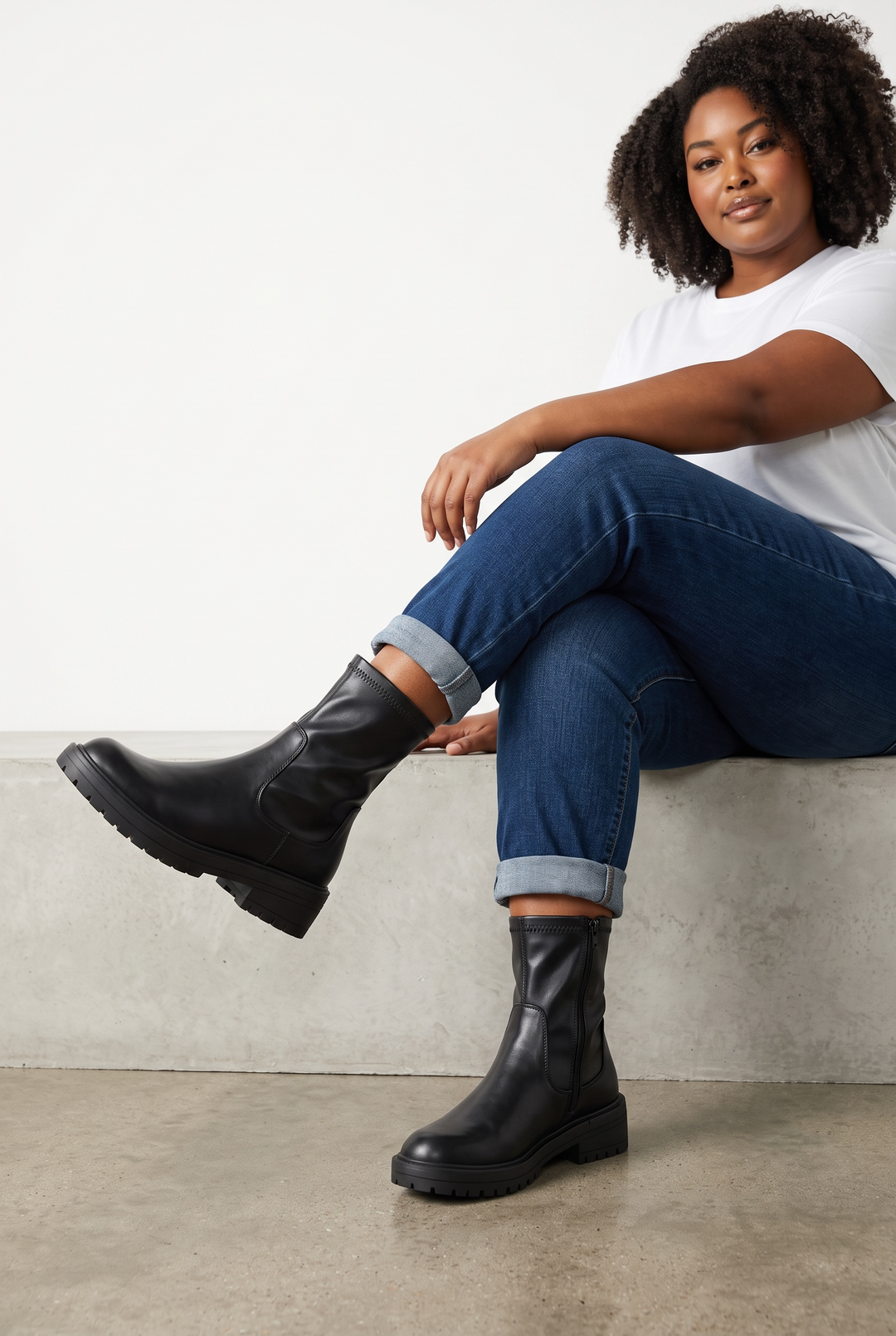 Women's black chunky biker ankle boots with side zips and lug soles