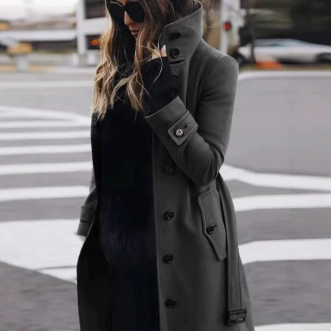 Women's knee-length button-front coat with stand collar, long sleeves, cuff straps and angled pockets