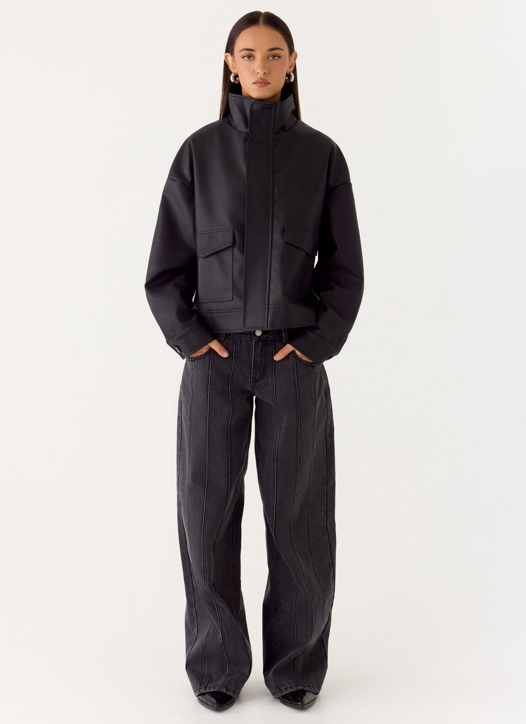 Women's black bomber jacket with mock neck, long sleeves and front flap pockets