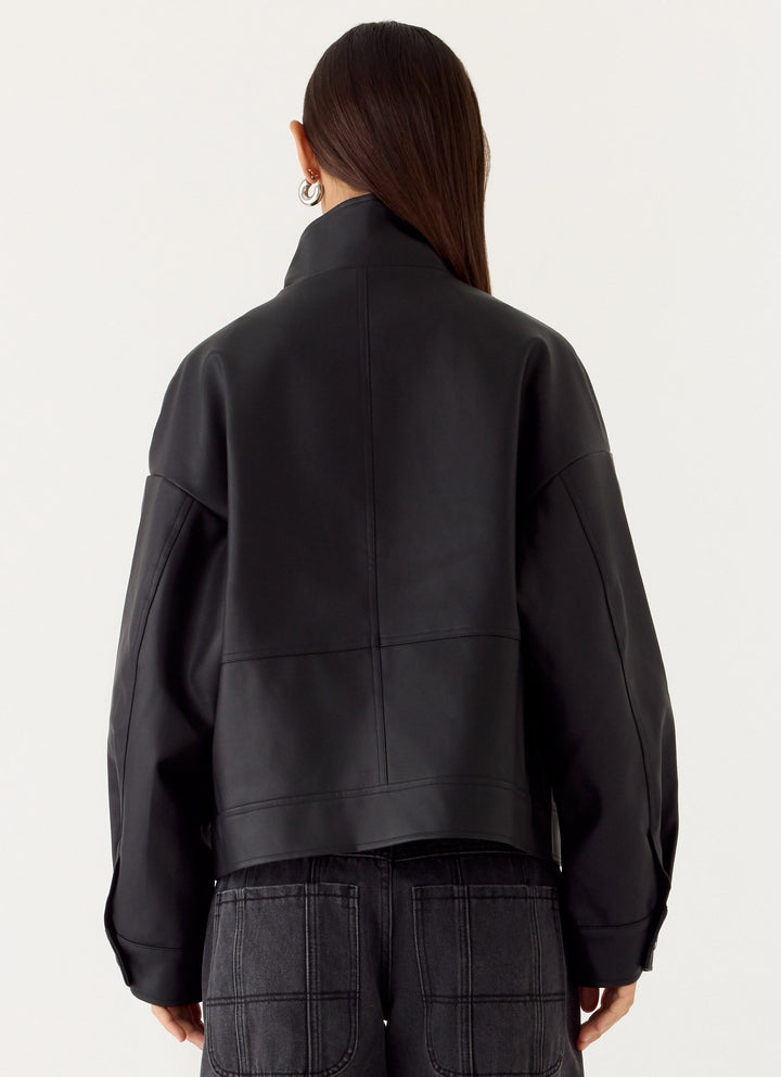 Women's black bomber jacket with mock neck, long sleeves and front flap pockets