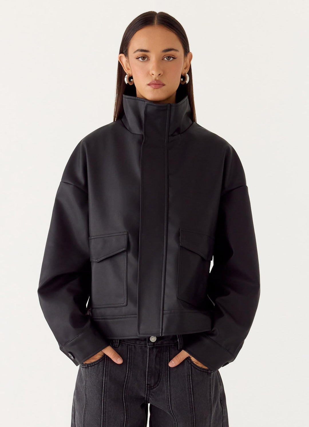 Women's black bomber jacket with mock neck, long sleeves and front flap pockets