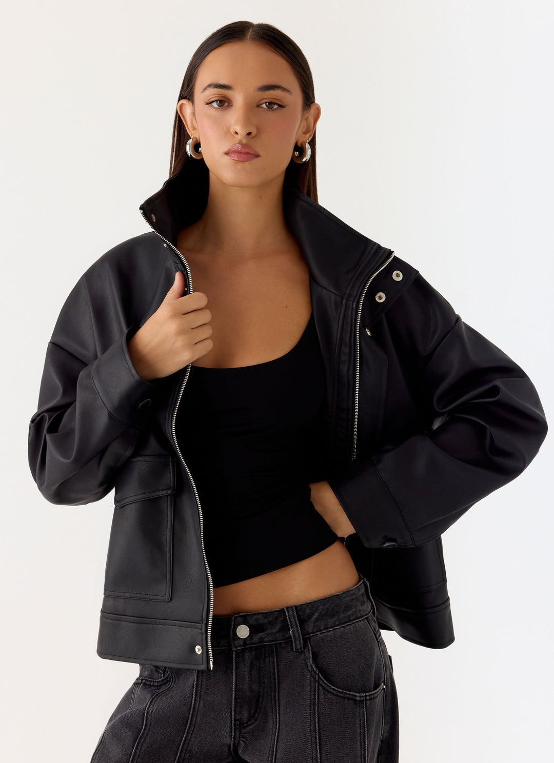Women's black bomber jacket with mock neck, long sleeves and front flap pockets